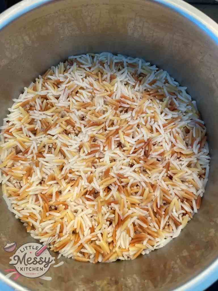 Cooked Rice pilaf in a saucepan. 