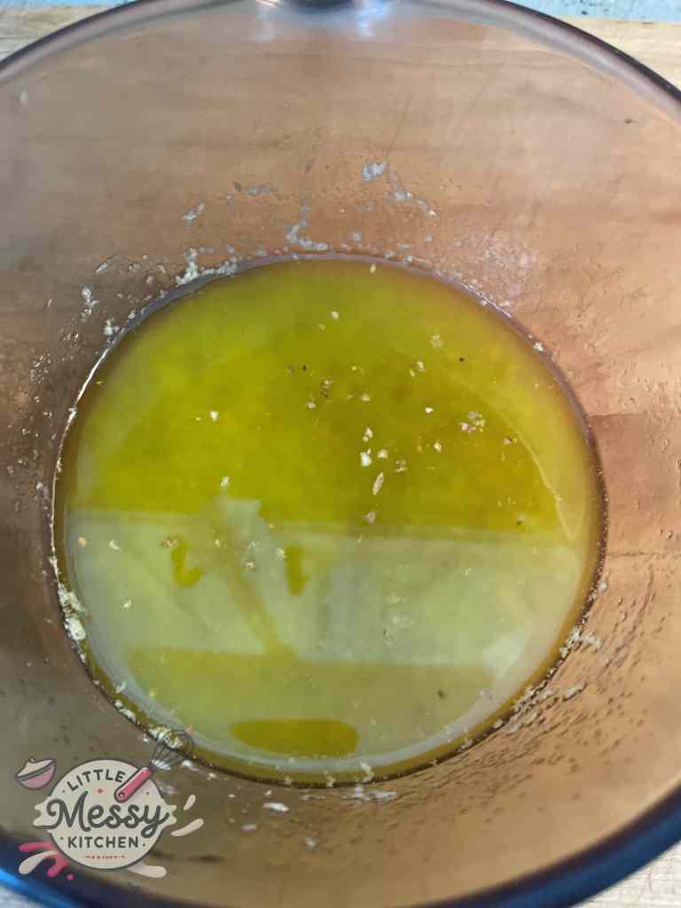 Melted butter with lemon juice and olive oil in a saucepan.