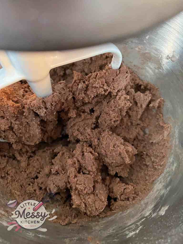 Butter mixture and flour mixture mixed in a stand mixer.