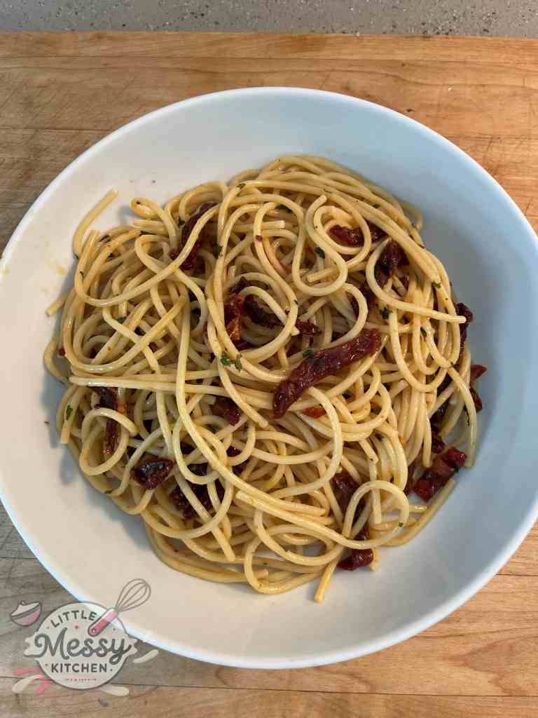 Spicy Sun-Dried Tomato Spaghetti served in a bowl