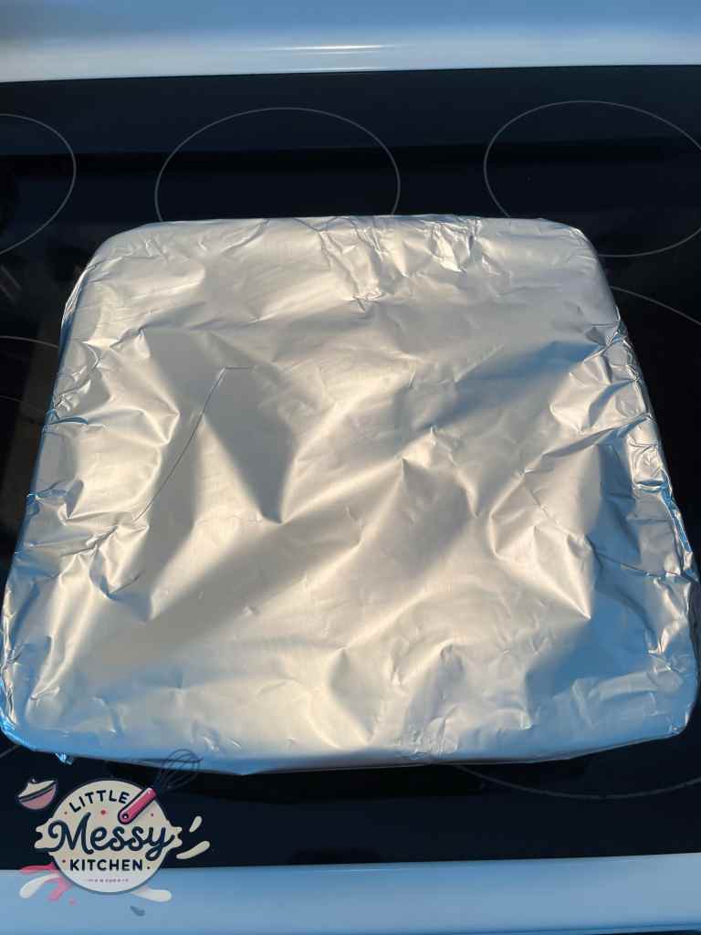 Aluminum foil covering baking dish.