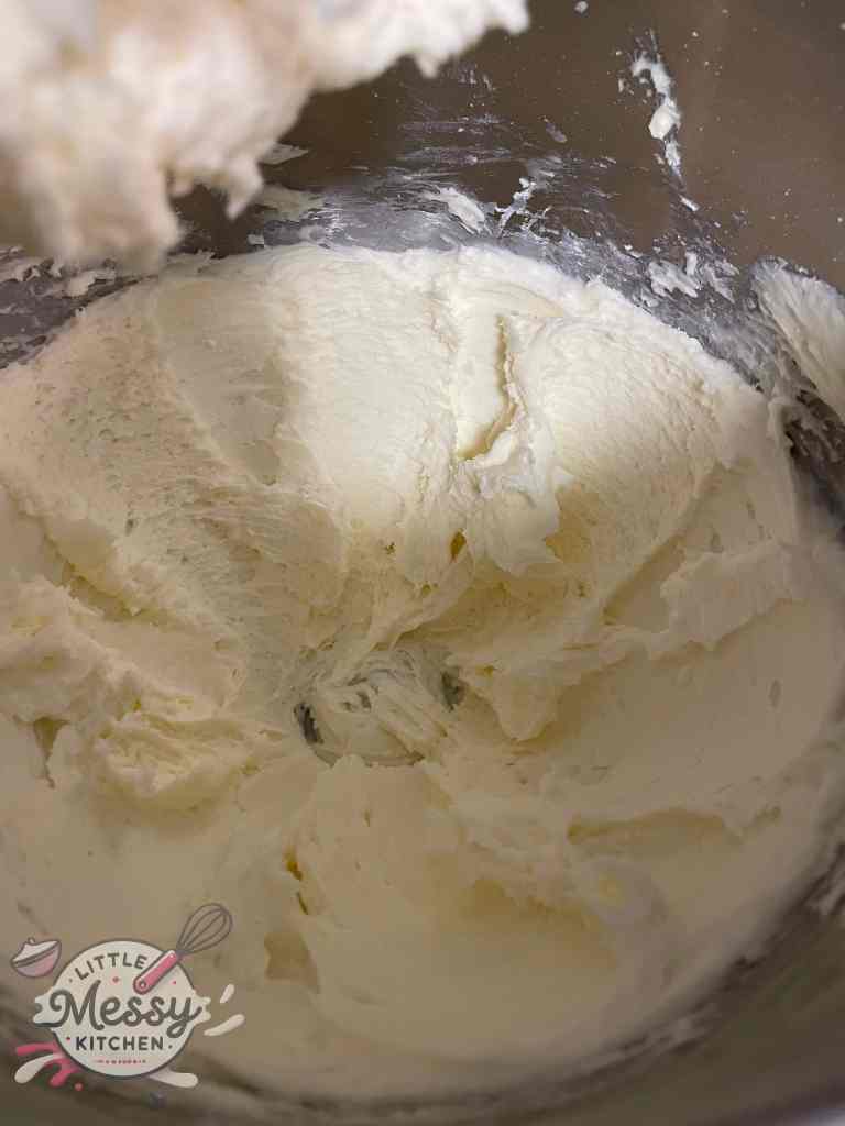 Butter and powder sugar combined in a stand mixer