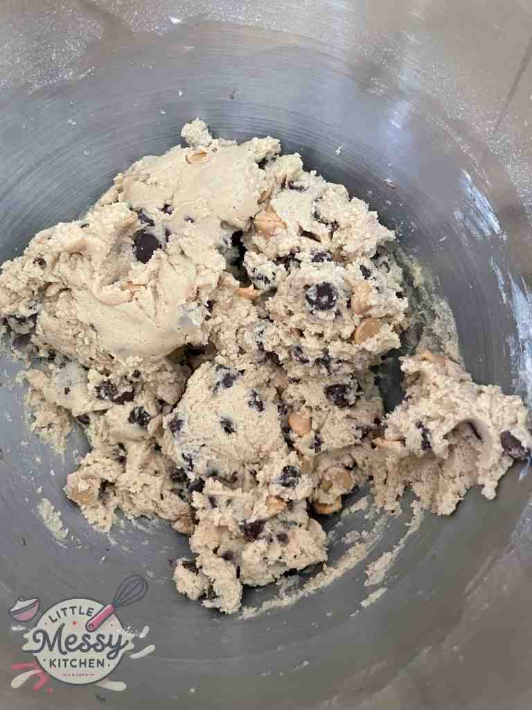 chocolate chips added to cookie dough in stand mixer