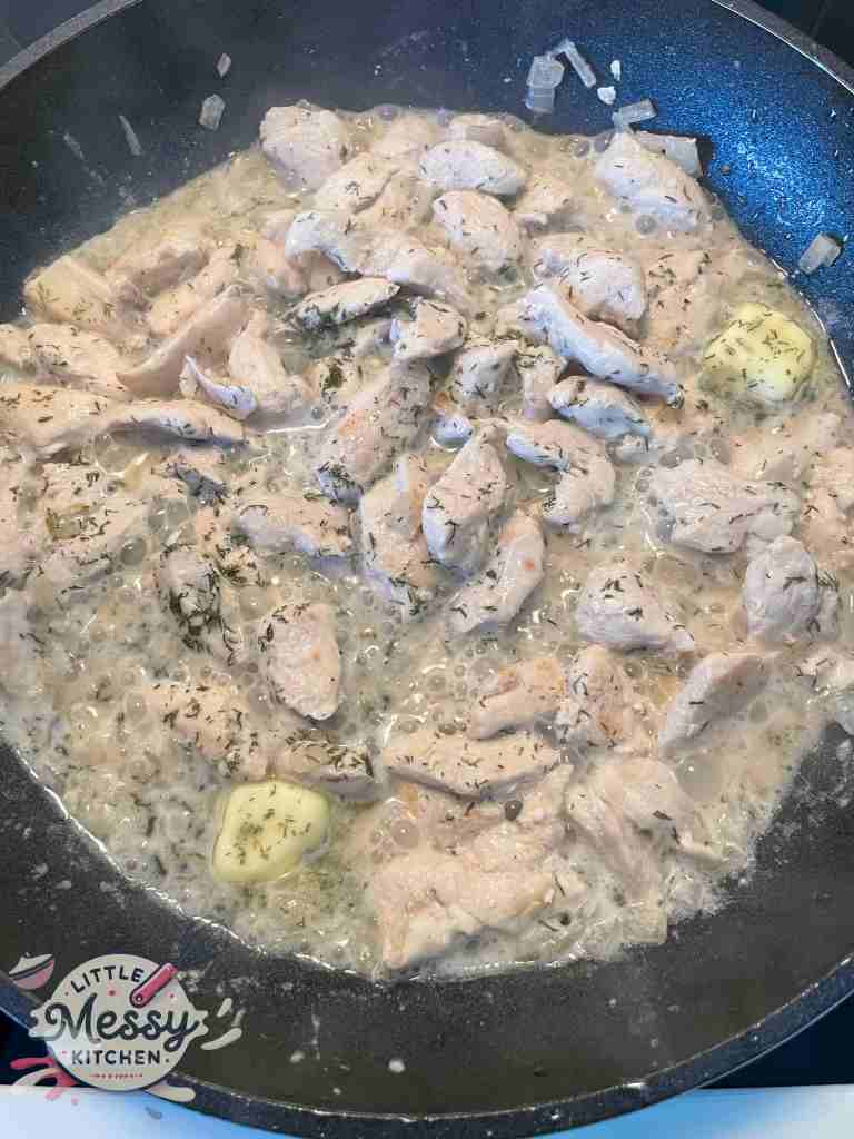 Butter and dill added to the frying pan.