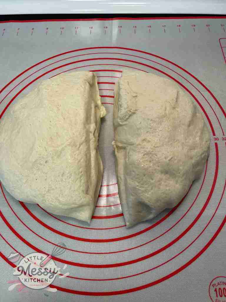 Bread dough cut in 2 pieces.