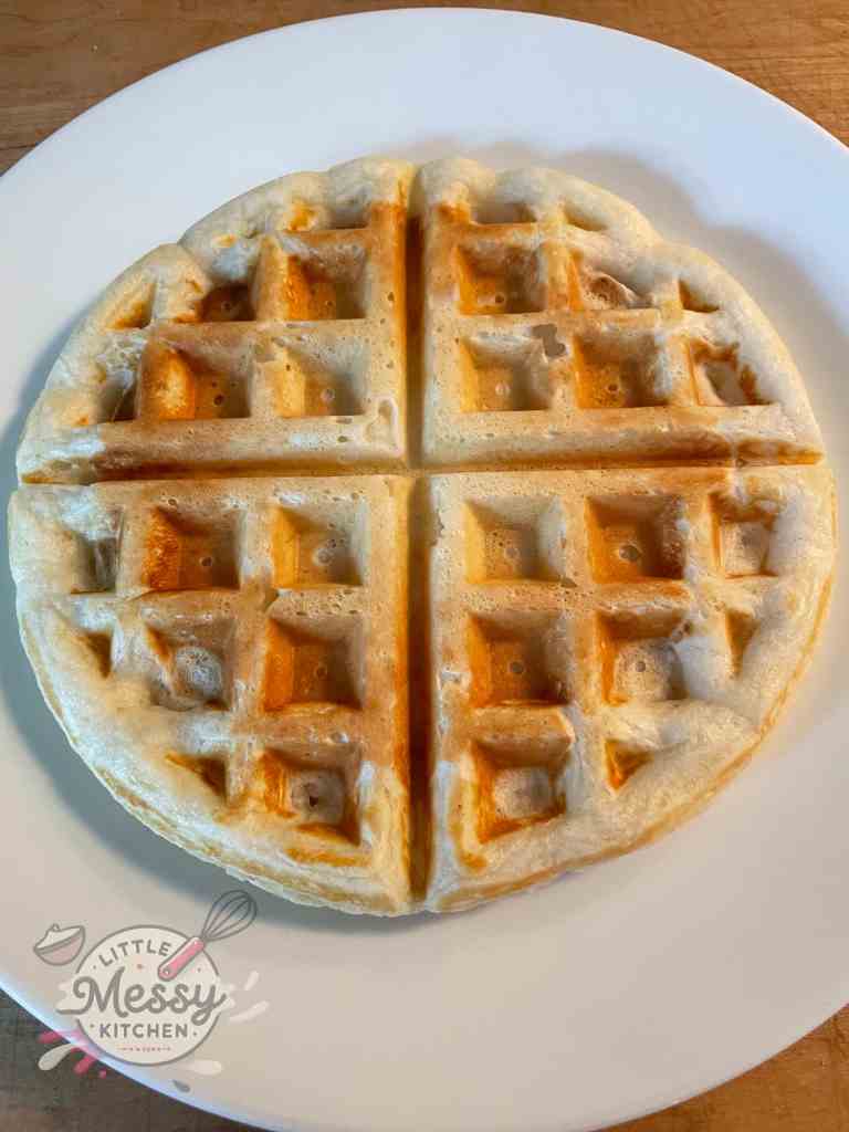 Cooked Waffle served in a plate.