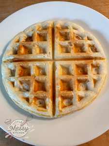 Cooked Waffle served in a plate.