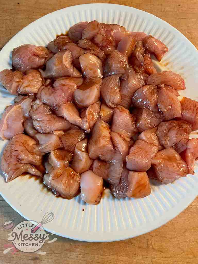 Chicken marinating in soy sauce and mirin.