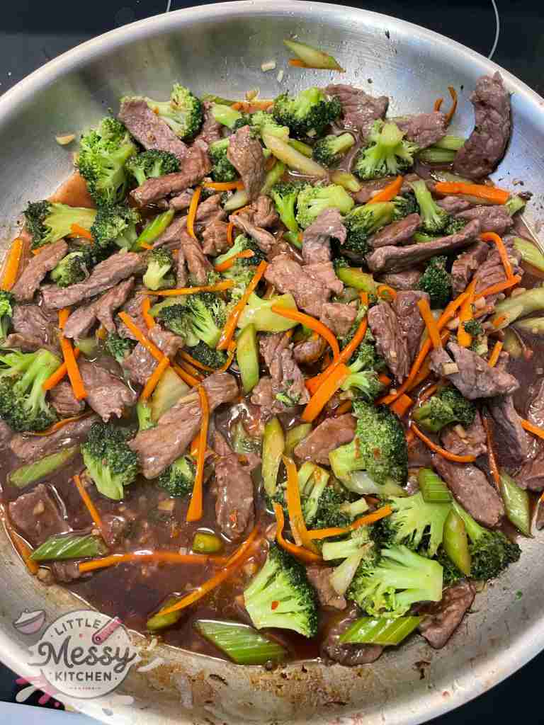 Beef Broccoli Lo Mein ready to be served in a frying pan.