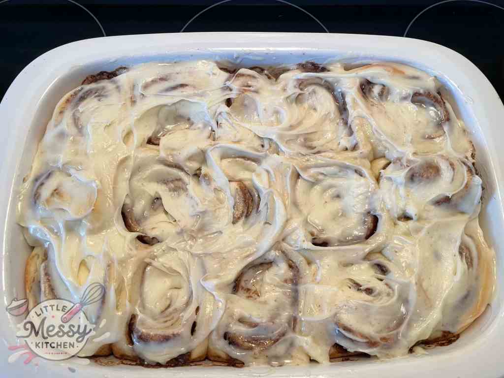 Cream Cheese spread over the cinnamon rolls.