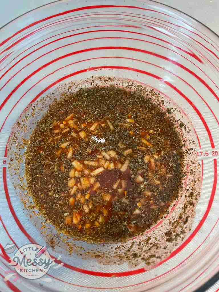 Ingredients for the marinade mixed in a bowl.