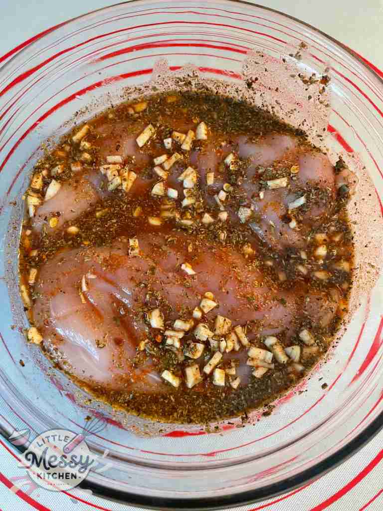 Chicken breast added to the marinade.