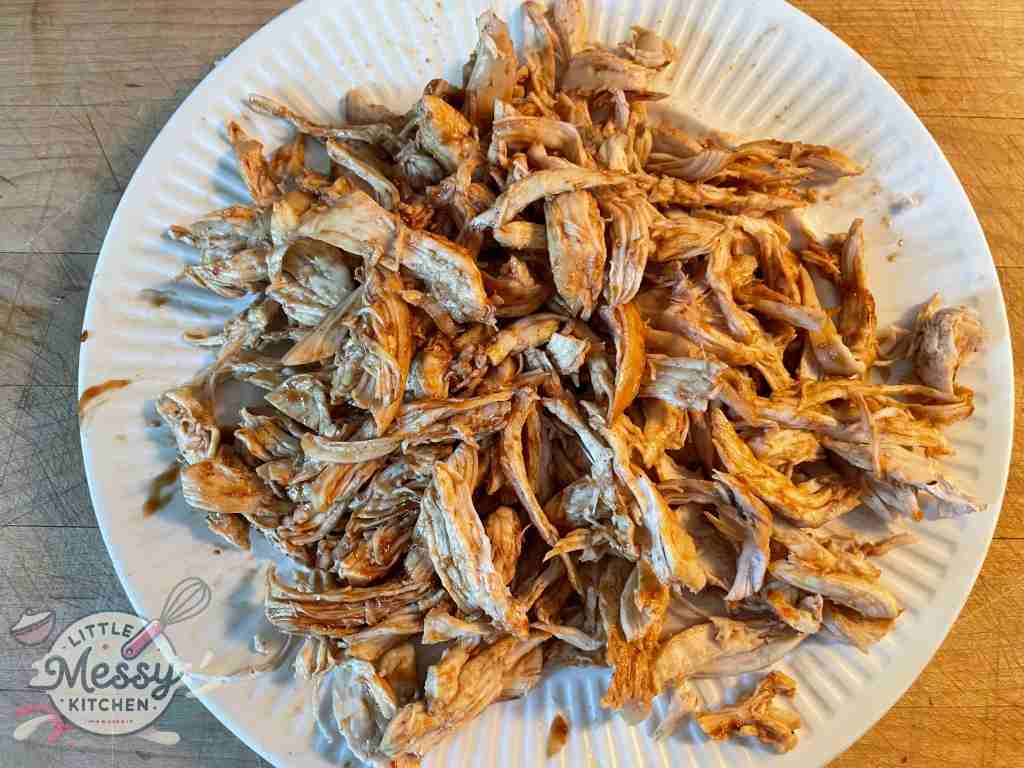 Shredded chicken on a plate.