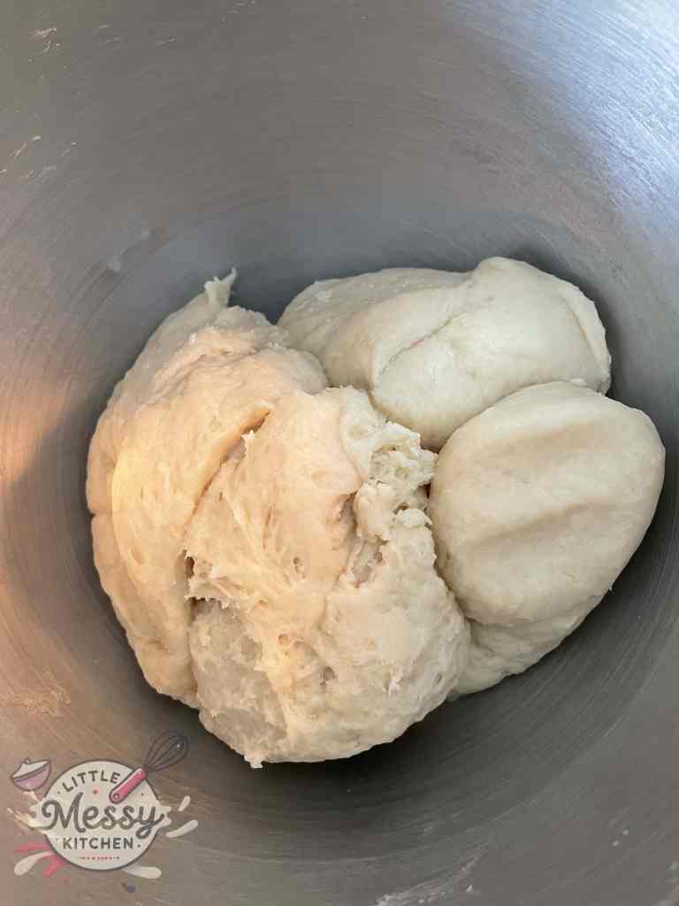 Milk/yeast mixture combined with the flour mixture to form a dough