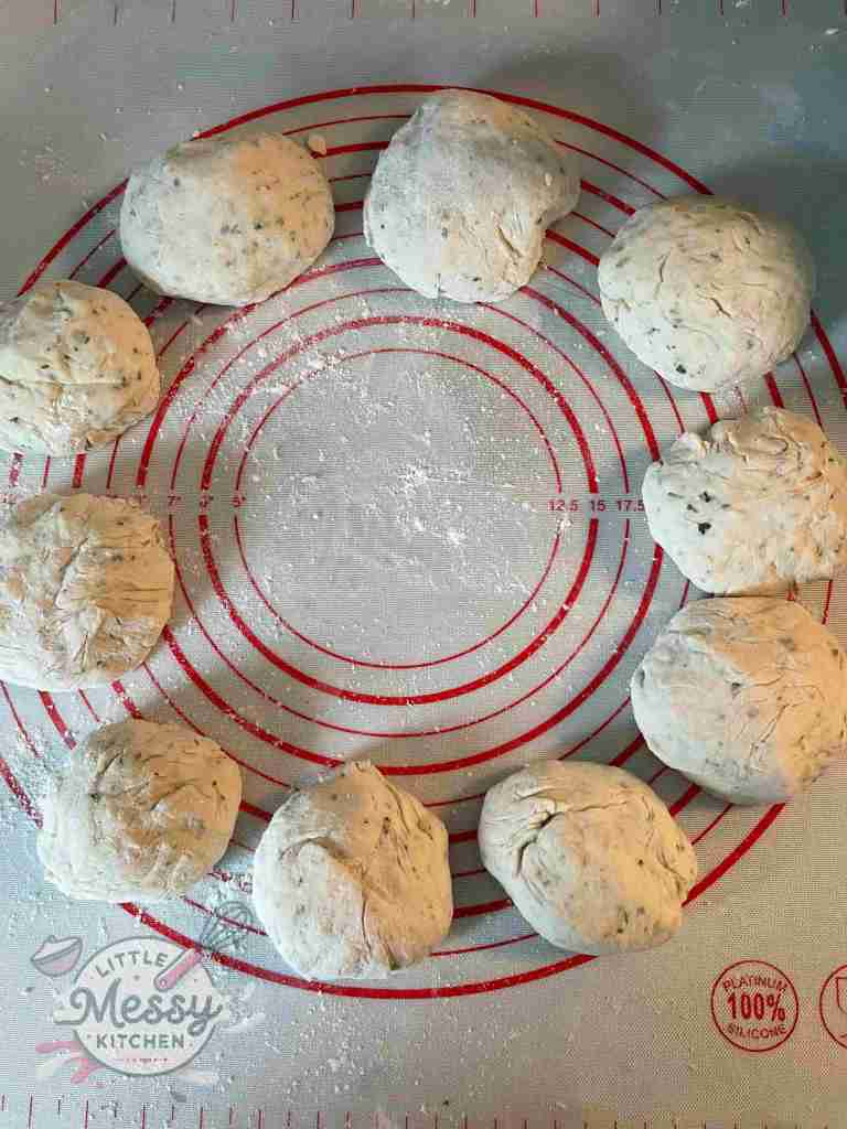 Dough divided in 10 smaller balls.