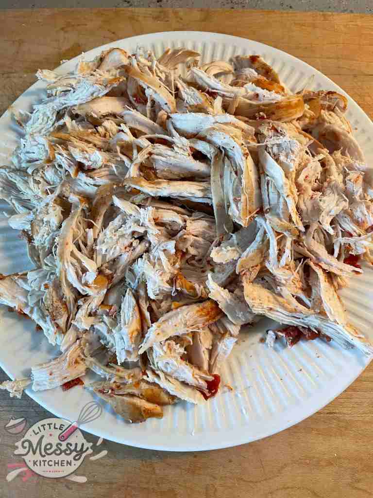 Shredded chicken on a plate.