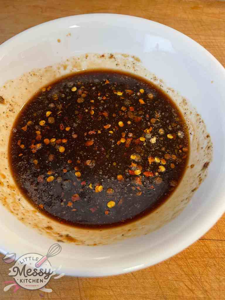 Ingredients for the sauce combined in a mixing bowl.