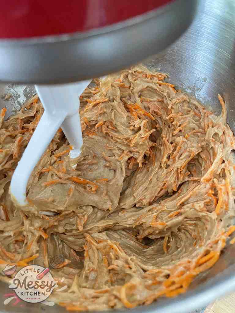 Flour and grated carrots added to the batter.