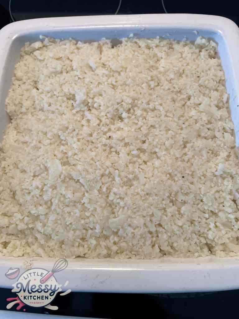 Mashed cauliflower added on top of beef and vegetables.