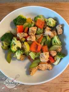 Chicken and Veggie skillet served in a white bowl.