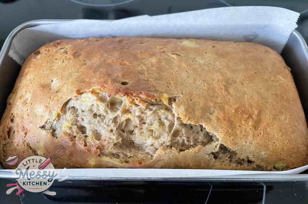Cooked banana bread in a loaf pan