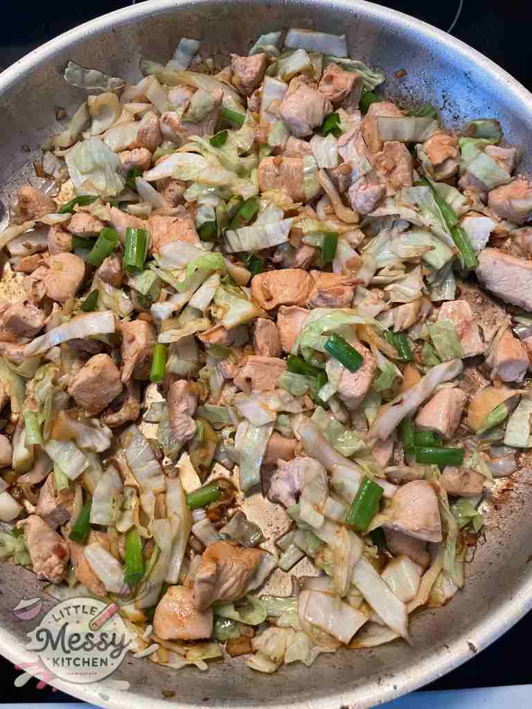 Chicken & Cabbage Stir Fry in a frying pan.
