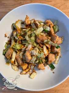 Serving of Chicken & Cabbage Stir Fry in a white bowl.