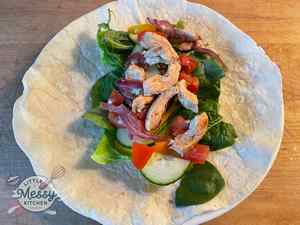 Chili-Lime Chicken Wrap served in a plate.