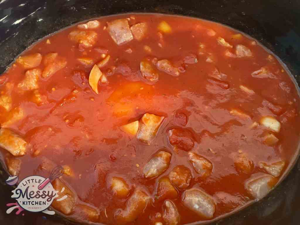 Main ingredients added to the slow cooker.