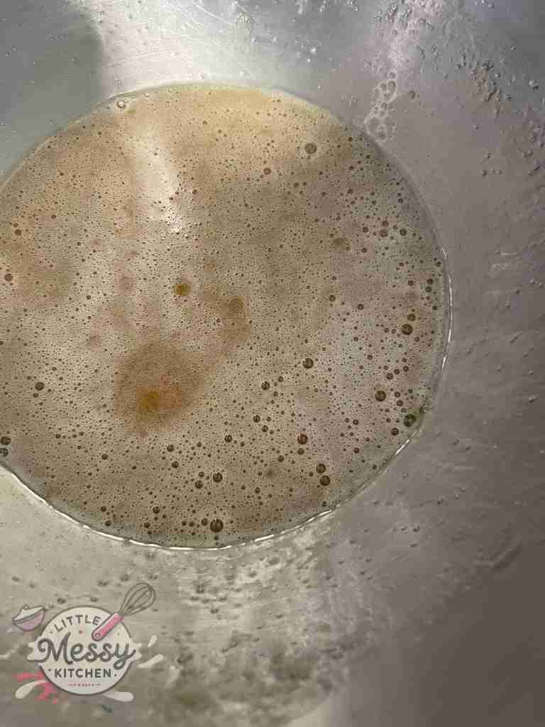 Butter and sugars combined in a bowl.