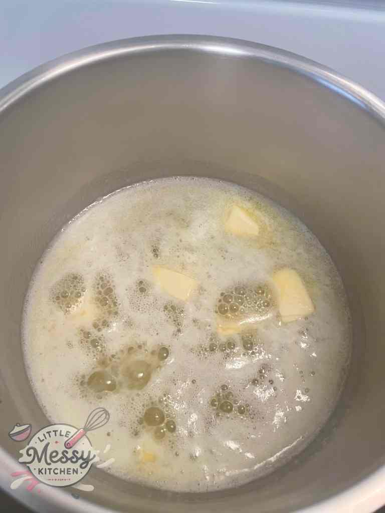 Butter melting in a saucepan.