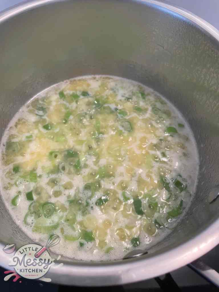 Vegetables added to the saucepan.