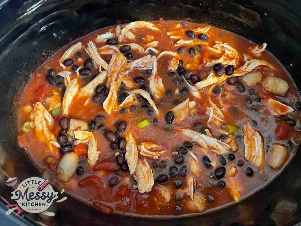 Black beans added to the slow cooker.