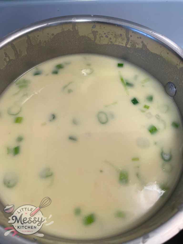 Cream of chicken soup in a saucepan.