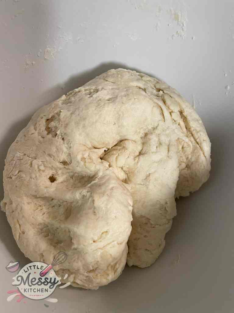 Dumpling dough in a mixing bowl.