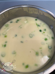 Cream of chicken soup in a saucepan.