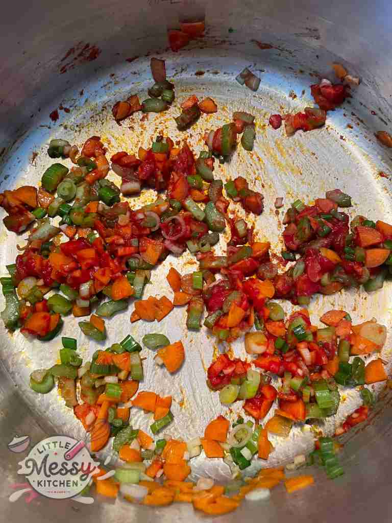Tomato paste added to the vegetables.