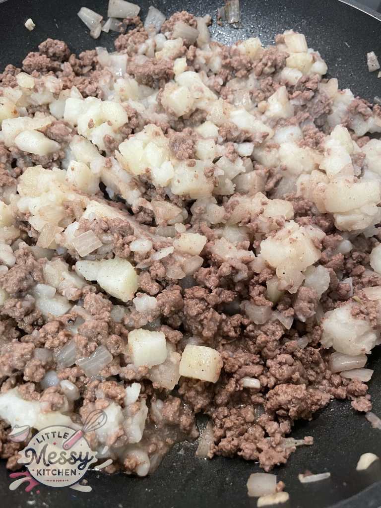 Tourtiere filling in skillet.