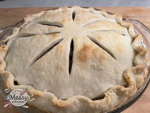 French Canadian Tourtière in a pie dish.