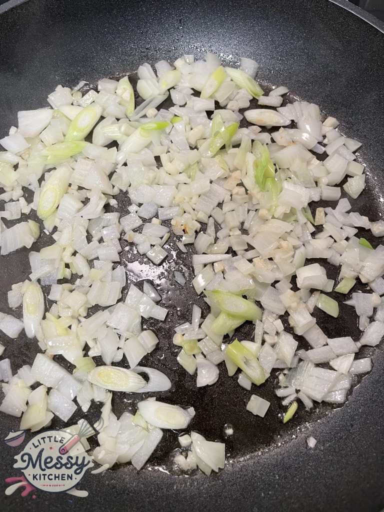 Onion, Garlic and green onions in skillet.